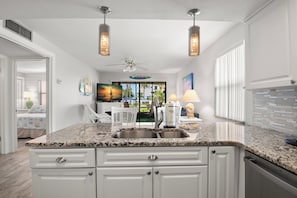 Condo, 2 Bedrooms, Kitchen | Private kitchen - Gulf Winds Beach Resort (St. Pete Beach)