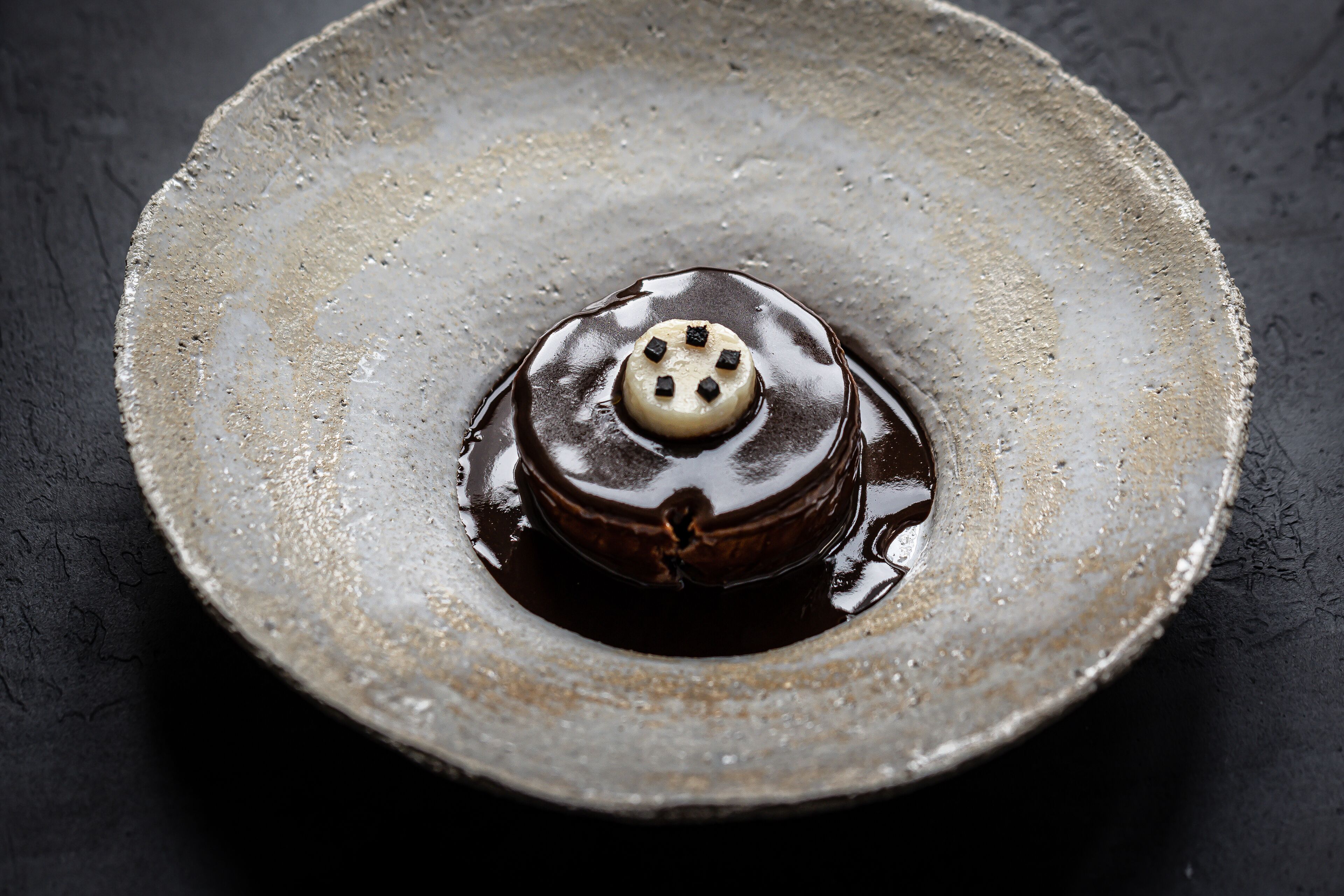 A dessert on a ceramic plate.