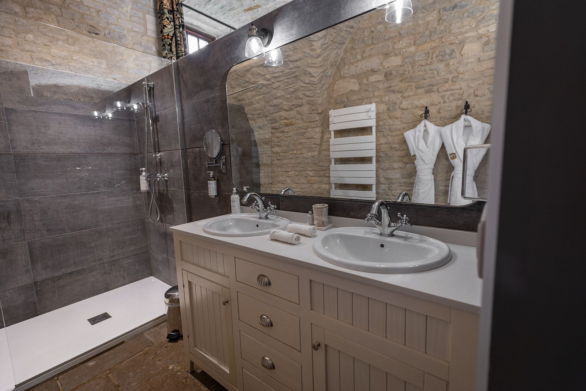 deluxe double room, 1 queen bed | bathroom | hair dryer, bathrobes, slippers, towels