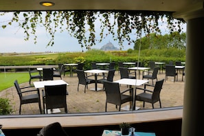 Breakfast, lunch, dinner served; local cuisine, garden views