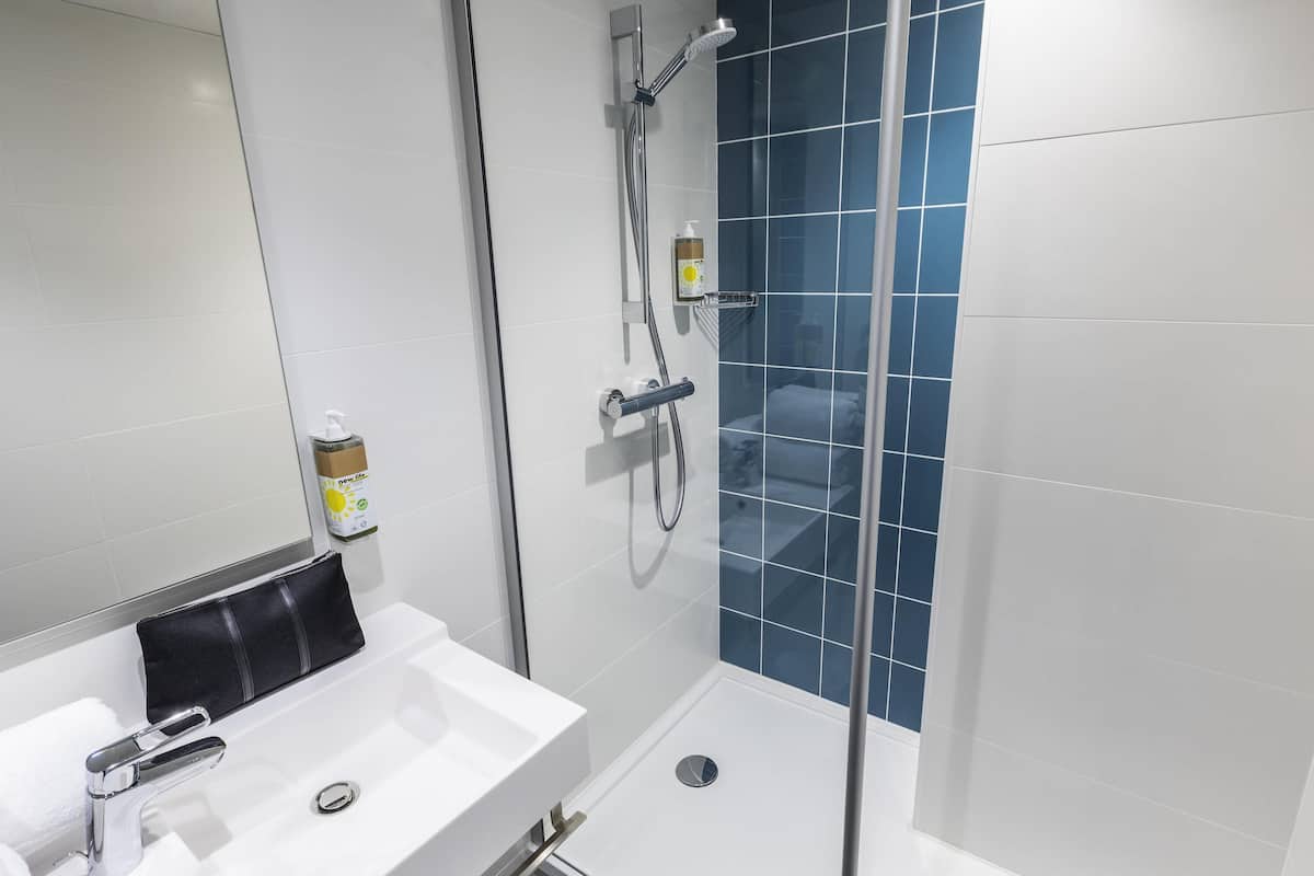 Desk, blackout drapes, soundproofing, iron/ironing board