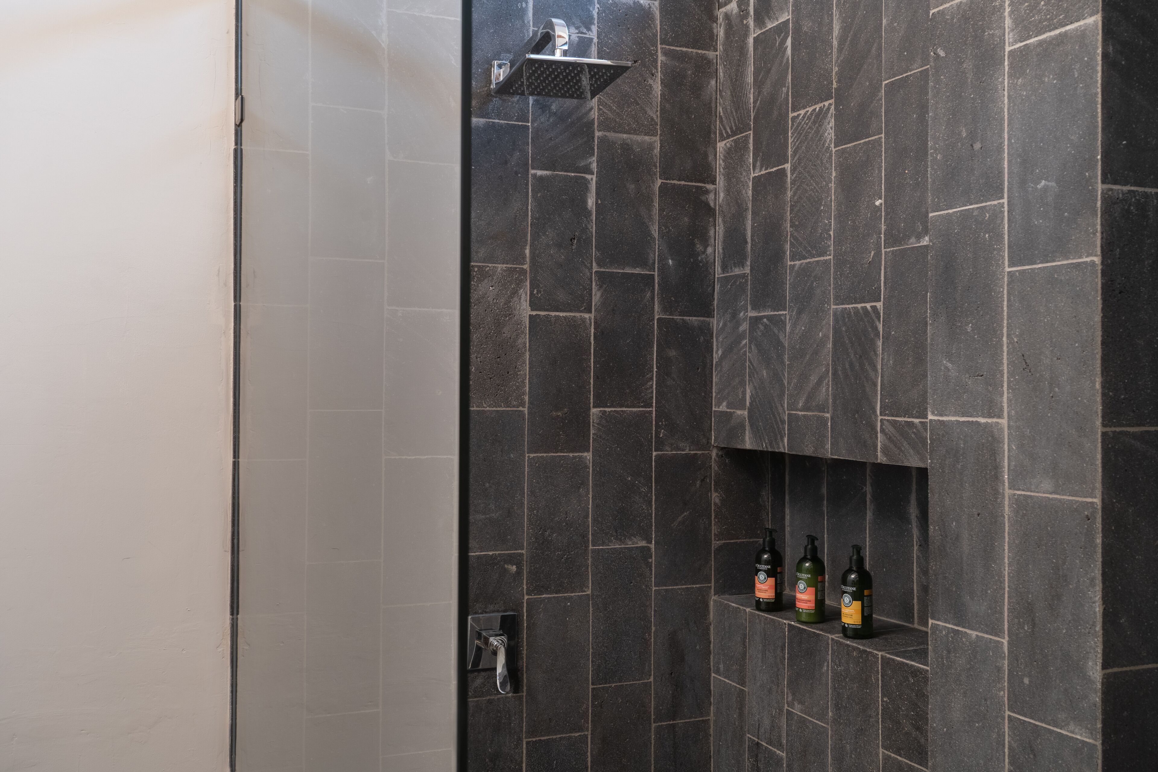 deluxe suite, 2 double beds | bathroom | shower, free toiletries, hair dryer, towels