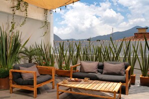 Suite Deluxe, 2 camas matrimoniales | Terraza o patio