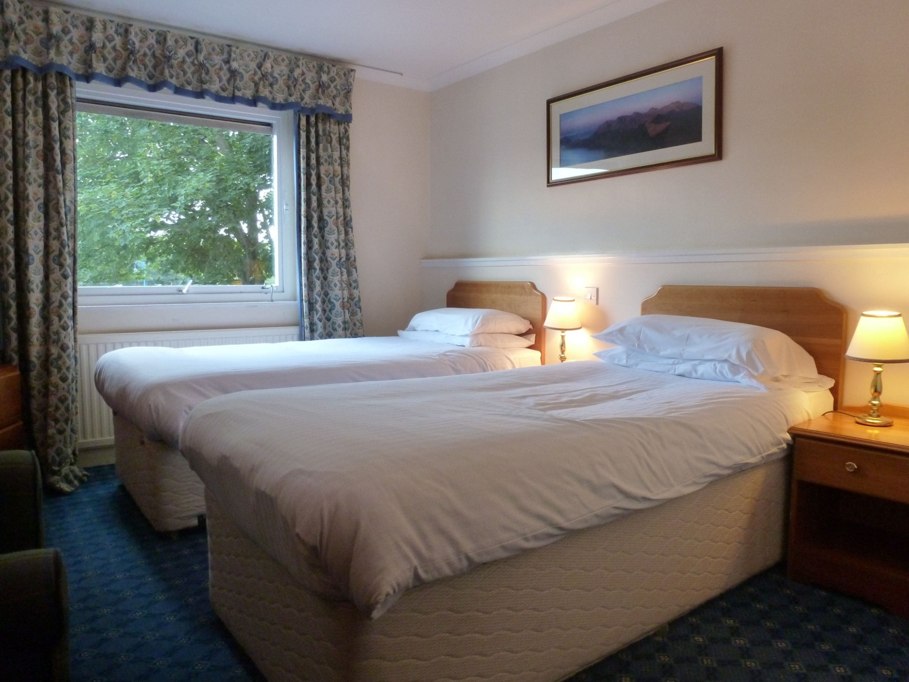 Family Room | Premium bedding, pillowtop beds, desk, laptop workspace