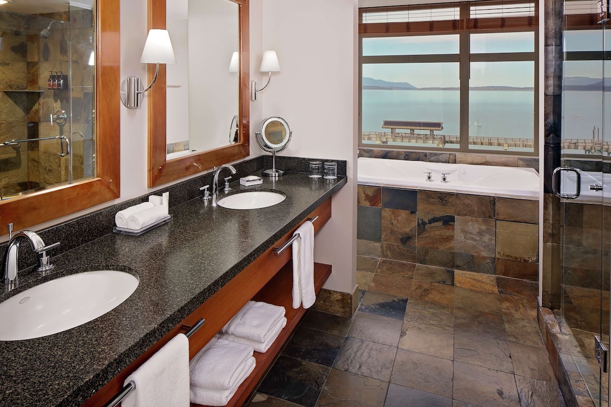 suite, 1 bedroom, bay view, corner | bathroom | shower, hair dryer, bathrobes, towels