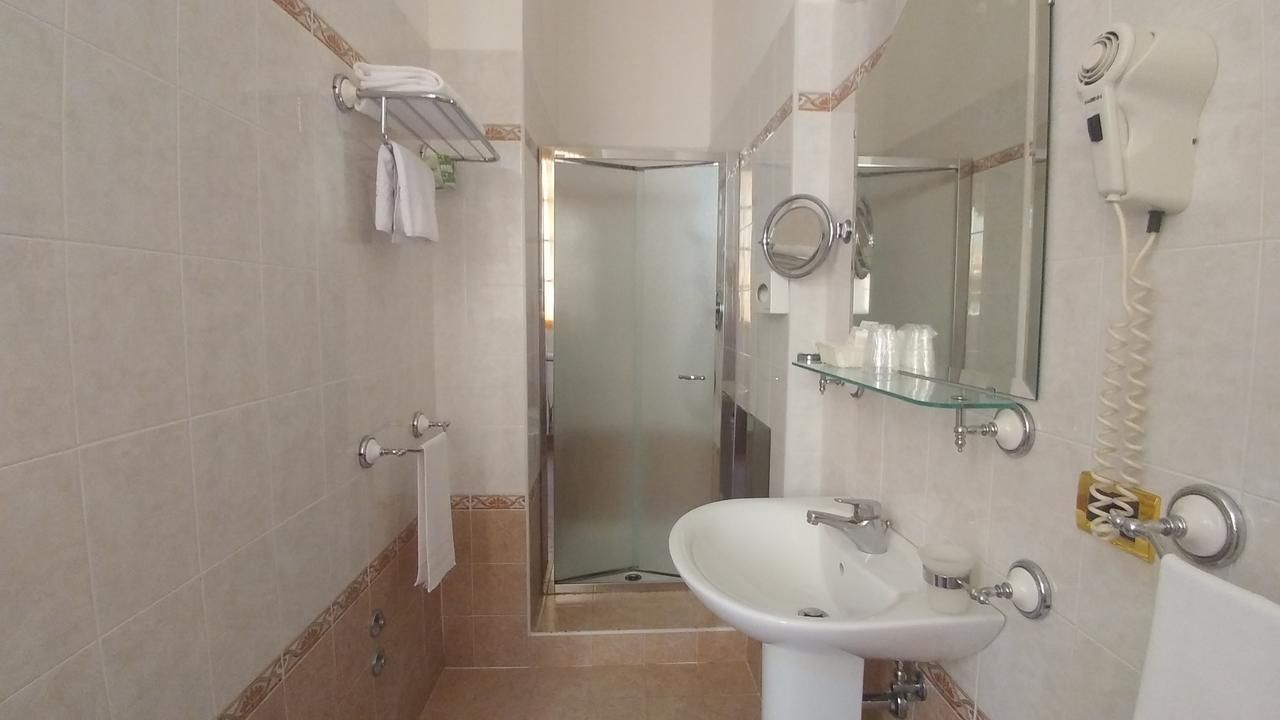 shower, free toiletries, hair dryer, slippers