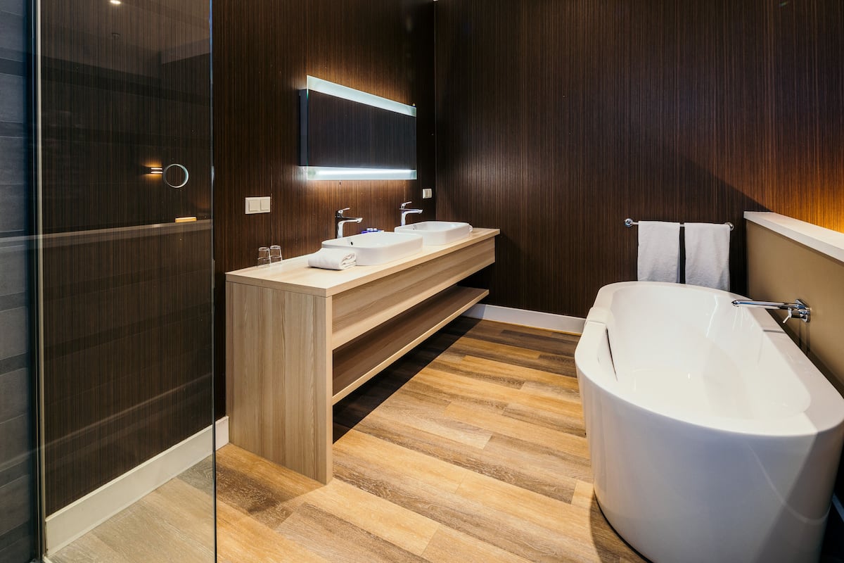 superior double or twin room, no windows (atlantis loft) | bathroom | combined shower/bathtub, rainfall showerhead, free toiletries