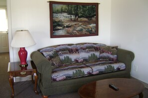 Suite, 1 King Bed, Kitchen | Living area | 32-inch TV with cable channels - Douglas Inn & Suites (Blue Ridge)