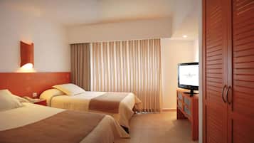 Minibar, coffres-forts dans les chambres, fer et planche Ă repasser