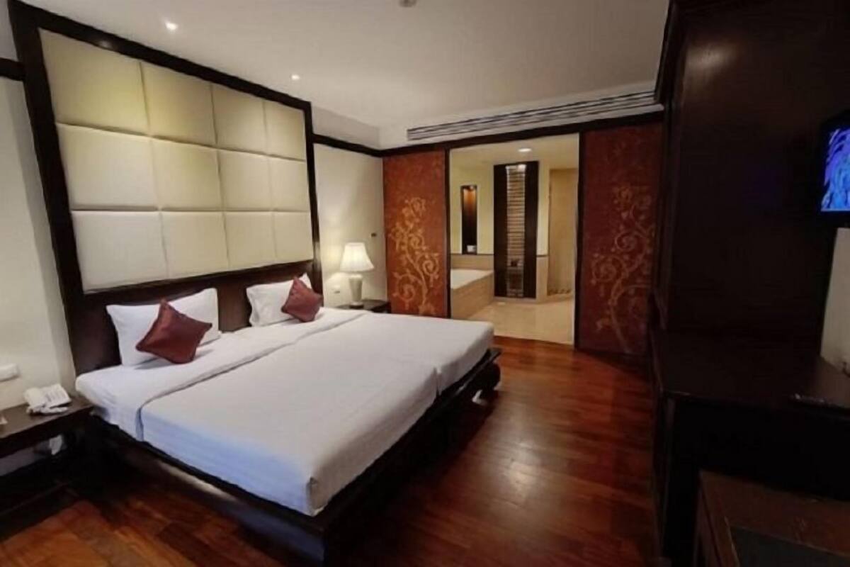 Een minibar, een kluis op de kamer, een bureau, gratis wifi