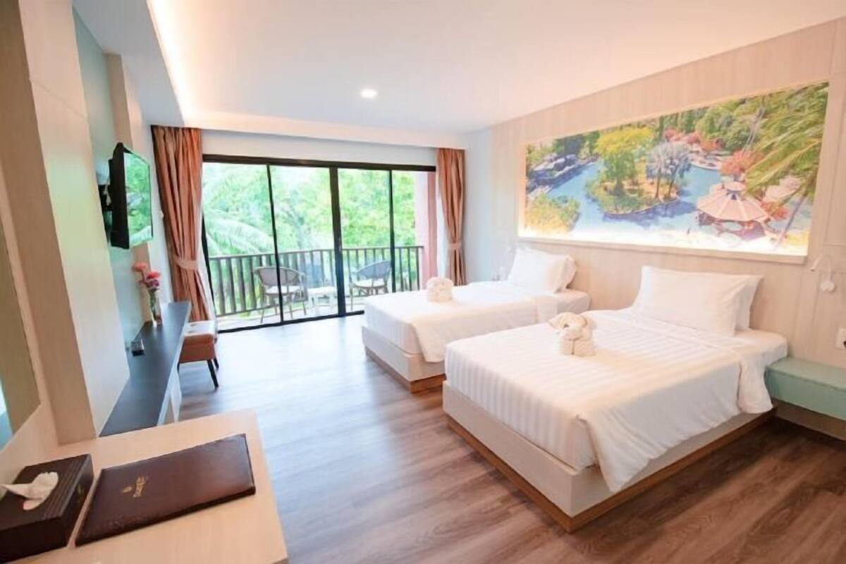 Een minibar, een kluis op de kamer, een bureau, gratis wifi