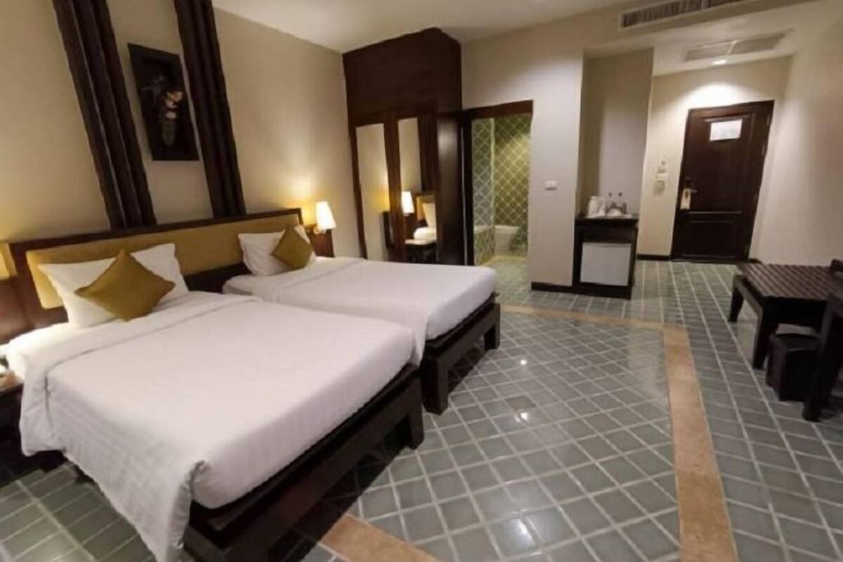 Een minibar, een kluis op de kamer, een bureau, gratis wifi