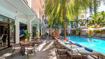 Outdoor pool, pool umbrellas, sun loungers