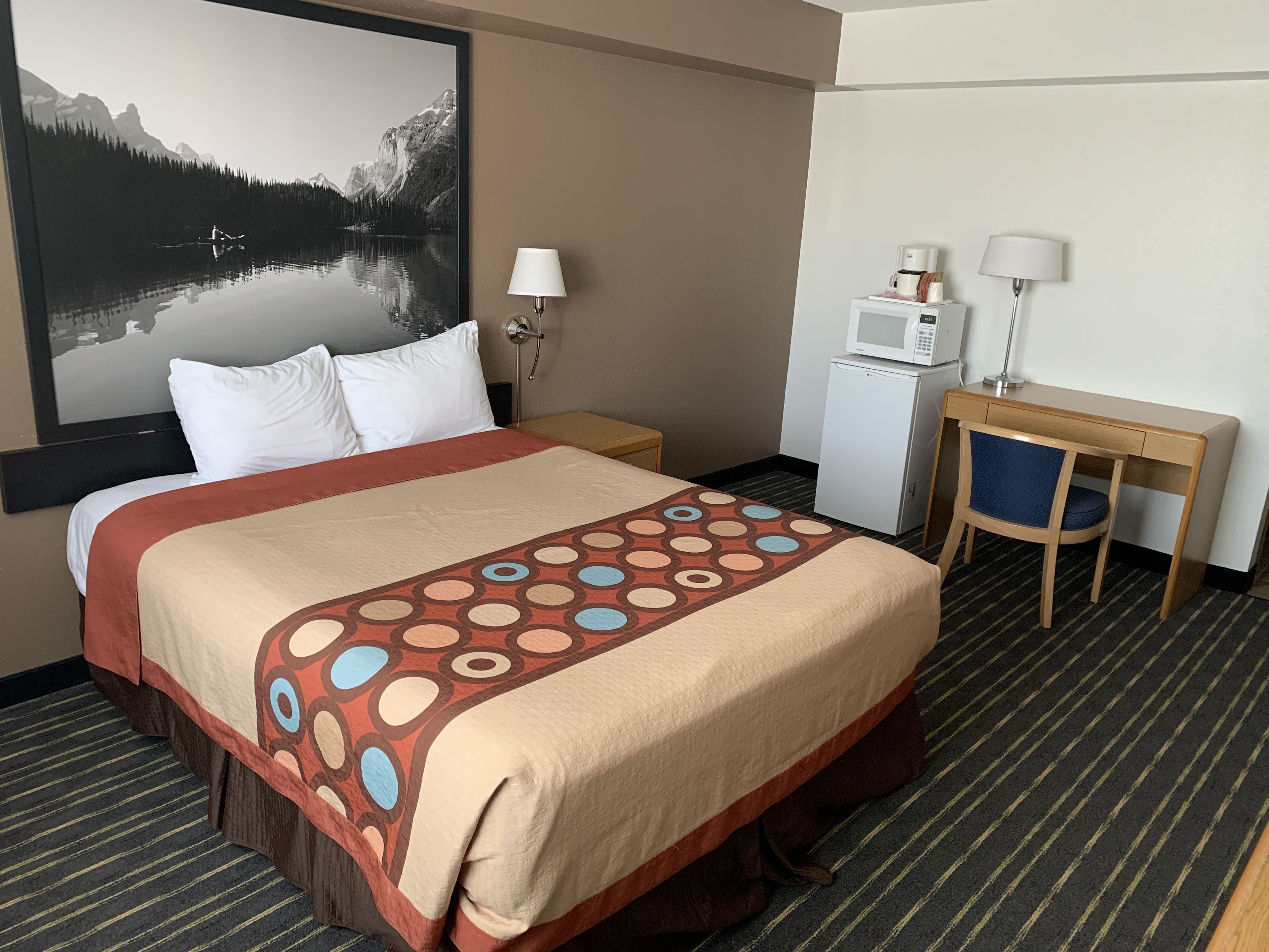 Desk, blackout drapes, iron/ironing board, free cribs/infant beds