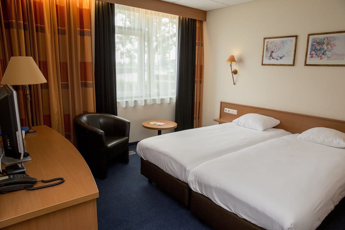 in-room safe, desk, blackout curtains, iron/ironing board