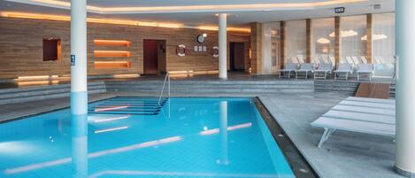 Indoor pool, outdoor pool, pool umbrellas, sun loungers