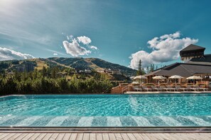 Indoor pool, outdoor pool, pool umbrellas, sun loungers