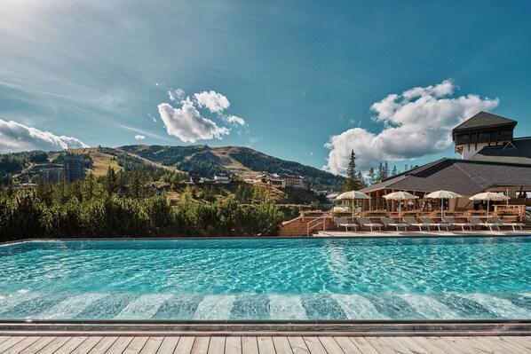 Indoor pool, outdoor pool, pool umbrellas, sun loungers