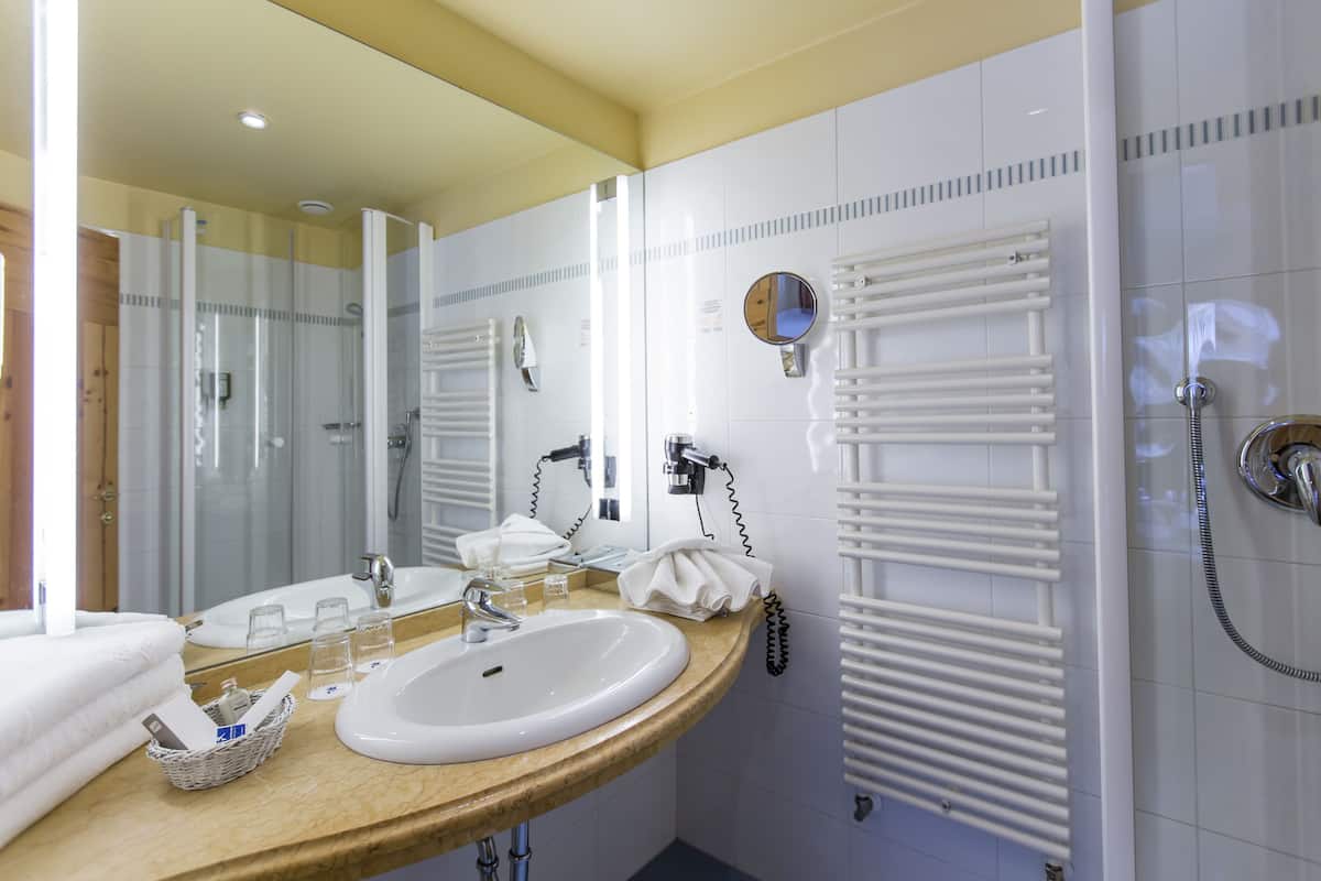 hair dryer, bathrobes, towels