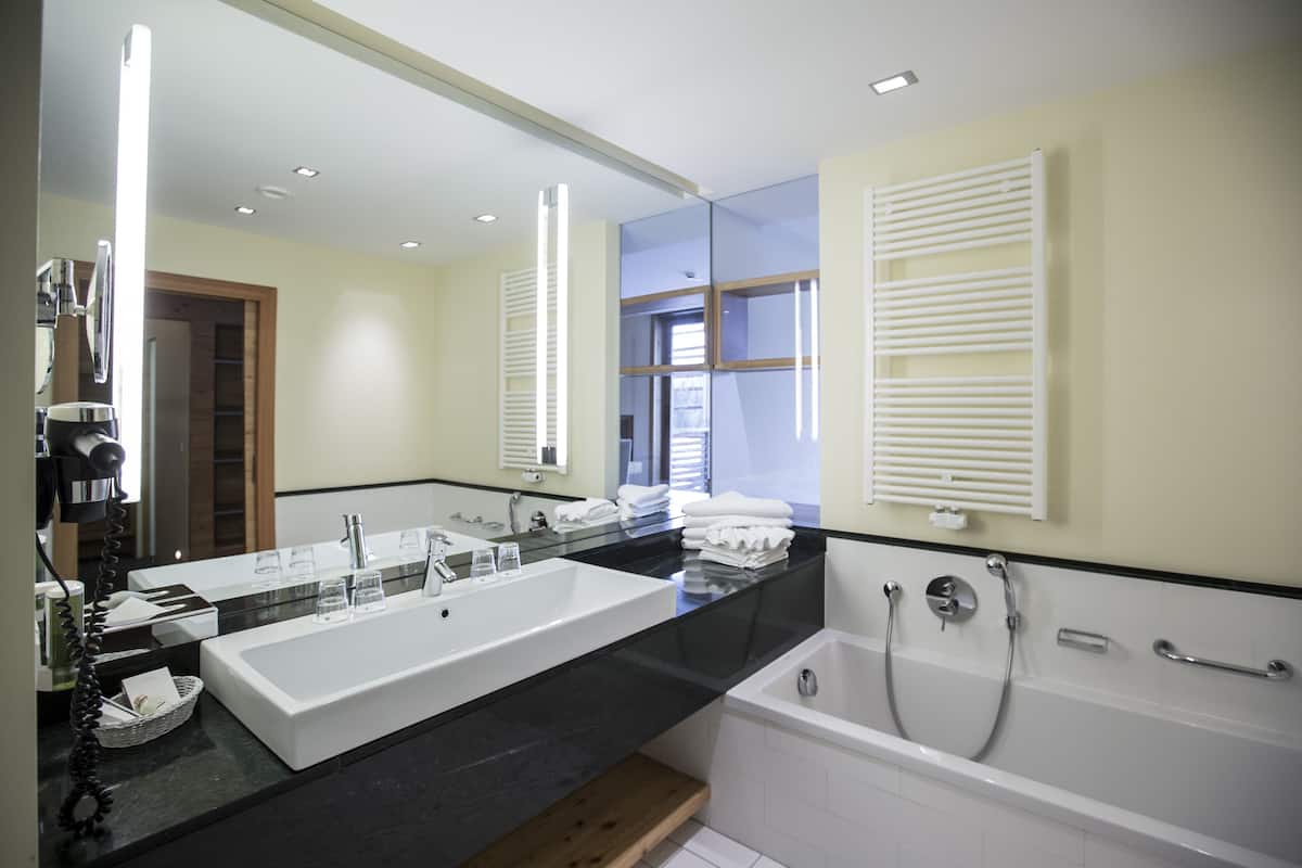 hair dryer, bathrobes, towels