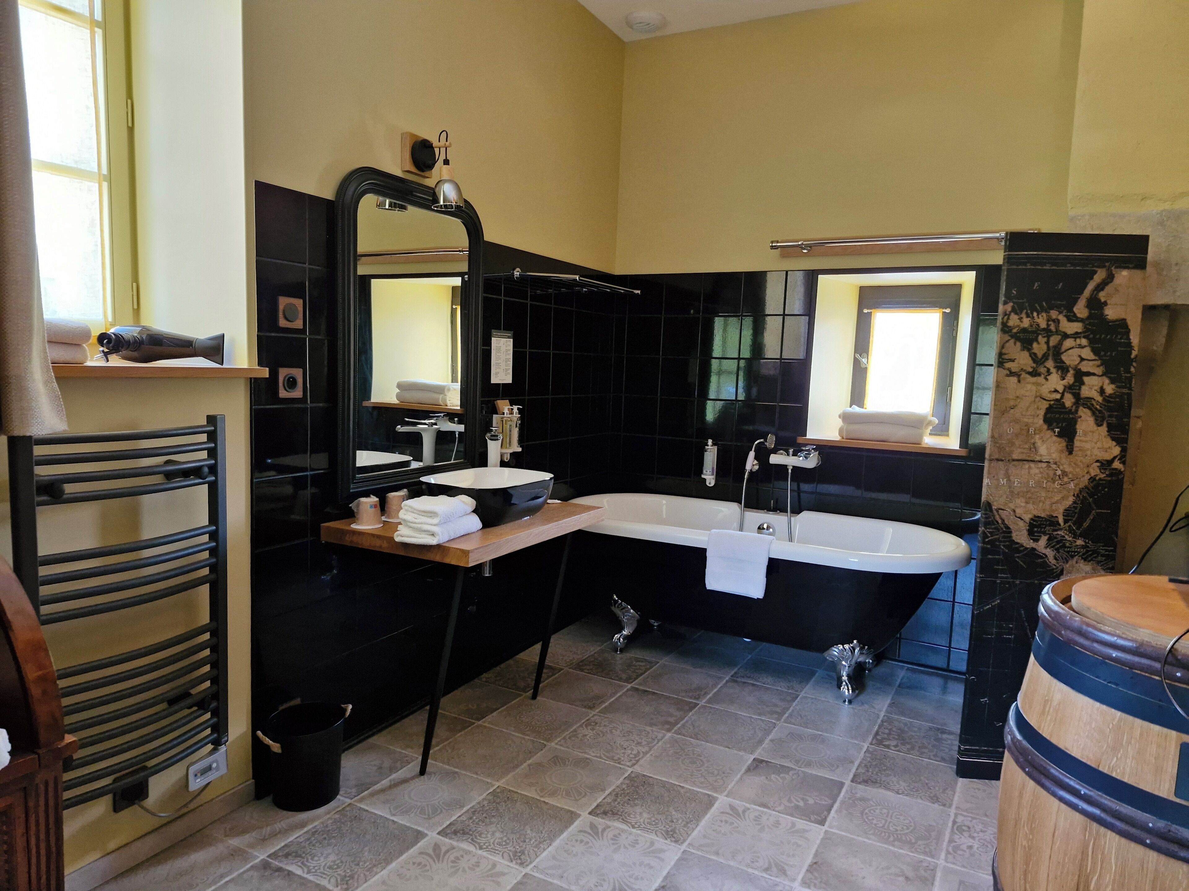 deluxe room | bathroom | shower, free toiletries, hair dryer, towels