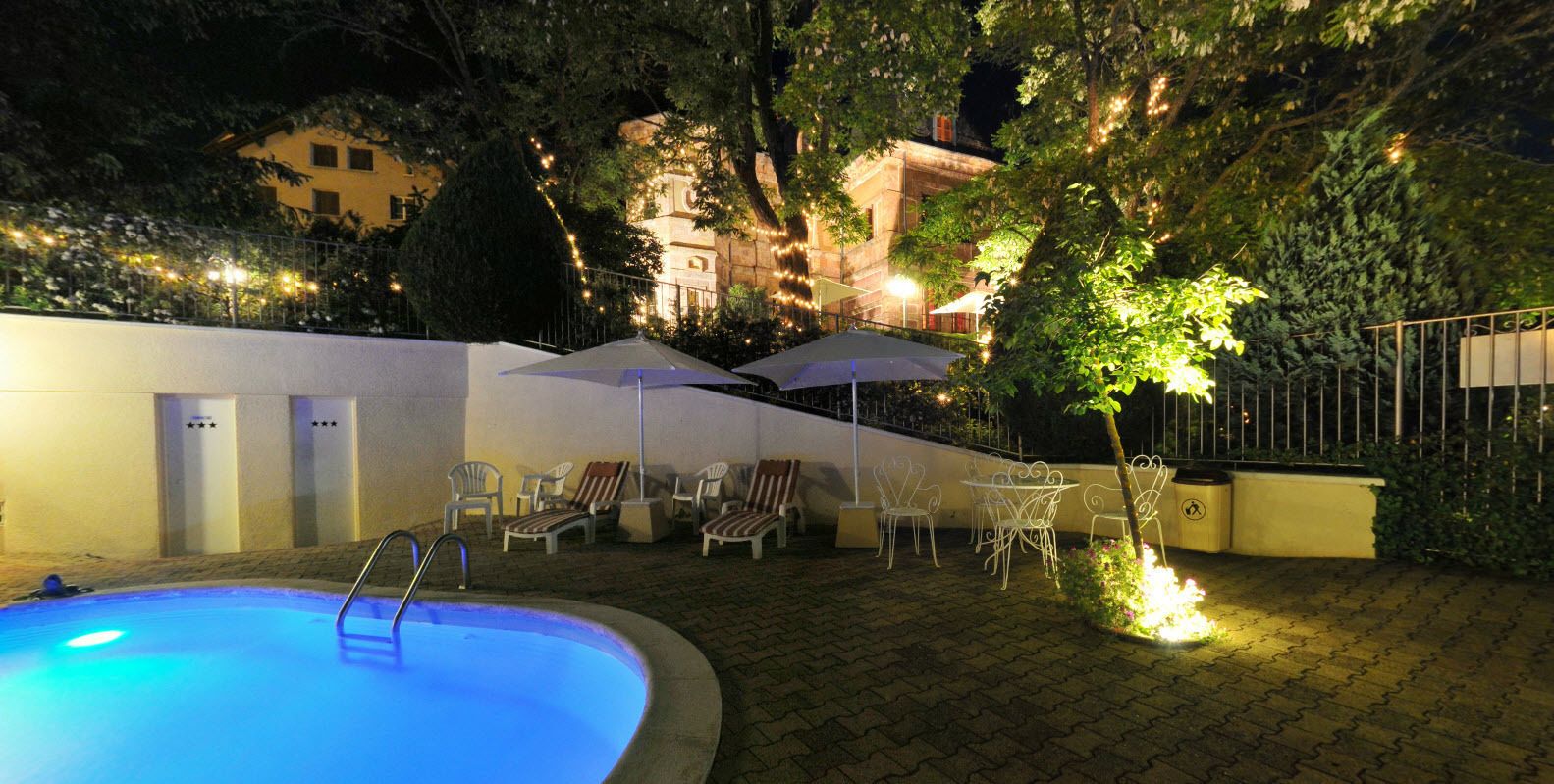 seasonal outdoor pool, pool umbrellas, pool loungers