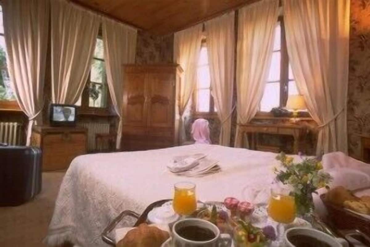 2 habitaciones, ropa de cama de alta calidad y minibar