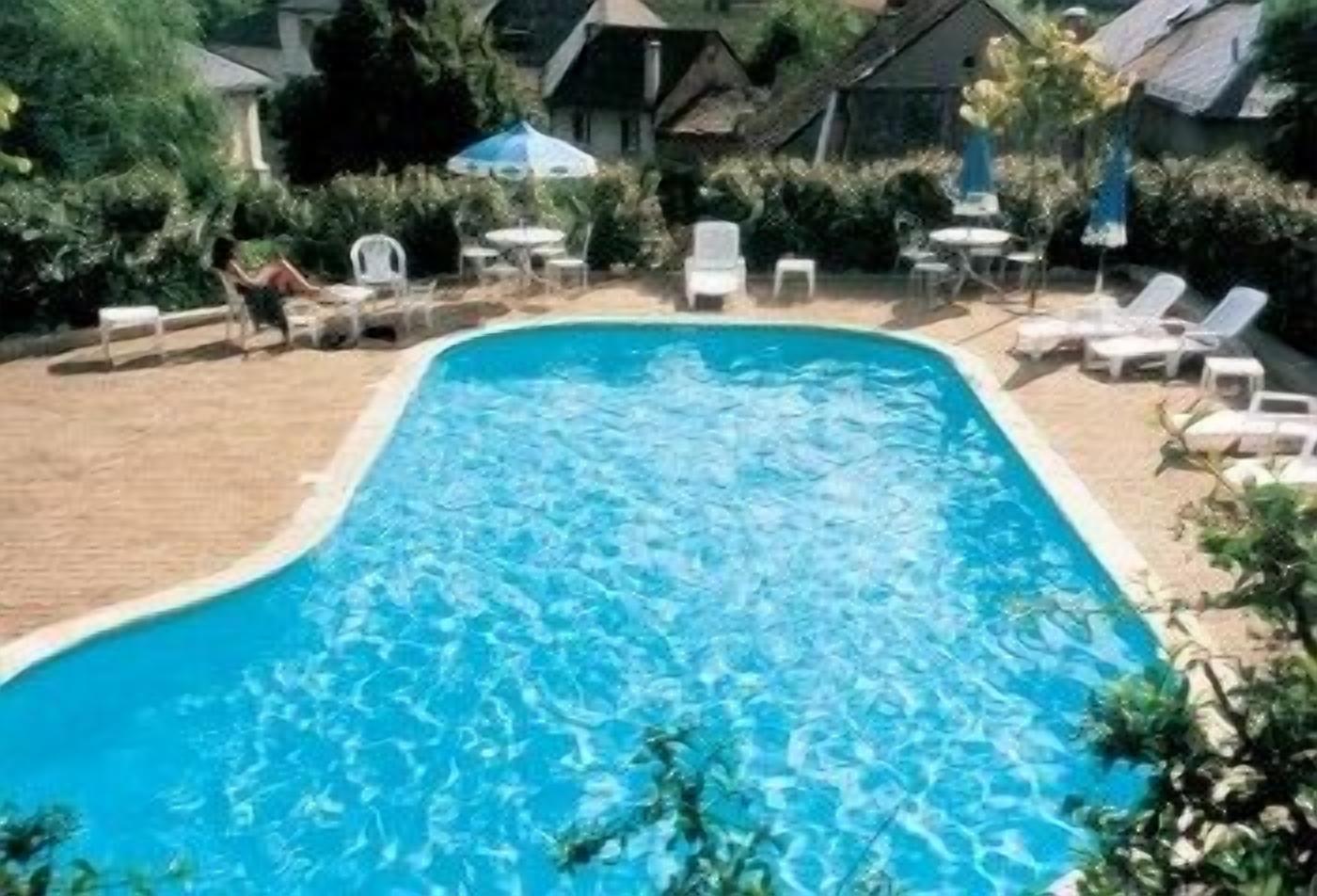 seasonal outdoor pool, pool umbrellas, pool loungers