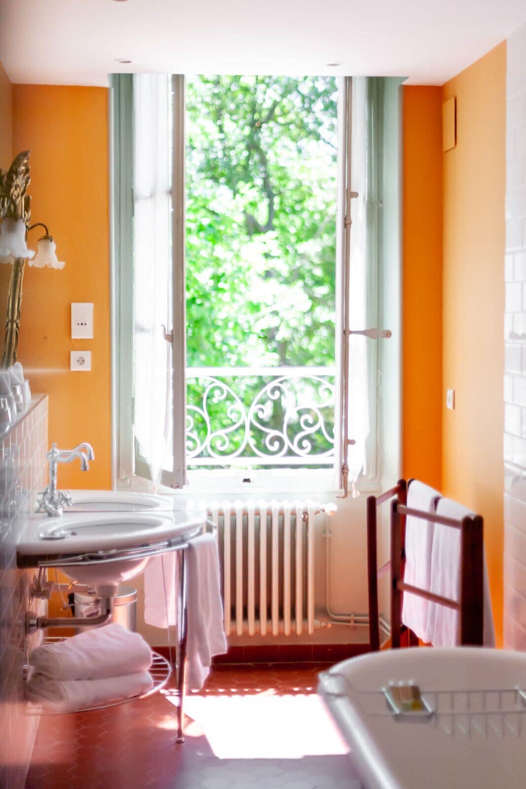 family room | bathroom | bathtub, deep-soaking bathtub, designer toiletries, hair dryer