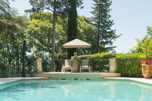 Outdoor pool, open 8:00 AM to 8:00 PM, pool umbrellas, sun loungers