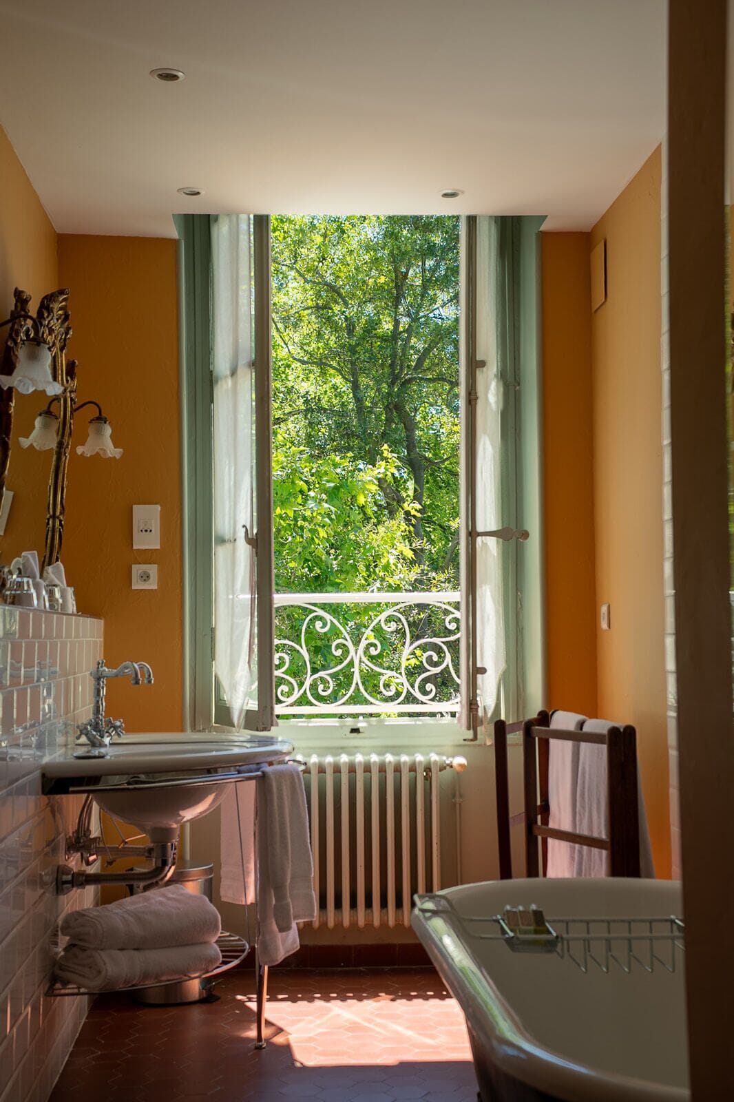 family room | bathroom amenities | bathtub, deep-soaking bathtub, designer toiletries, hair dryer