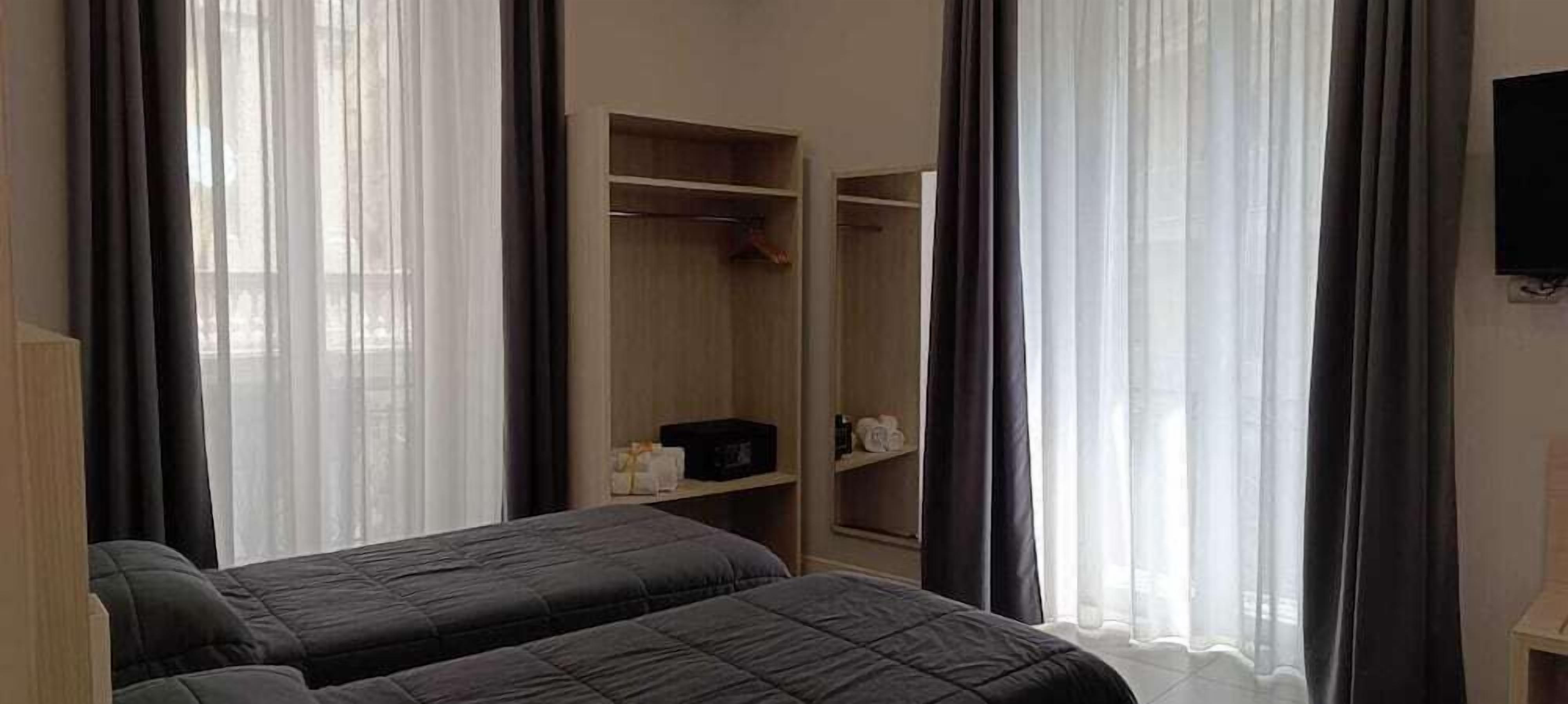Down duvets, desk, blackout curtains, iron/ironing board