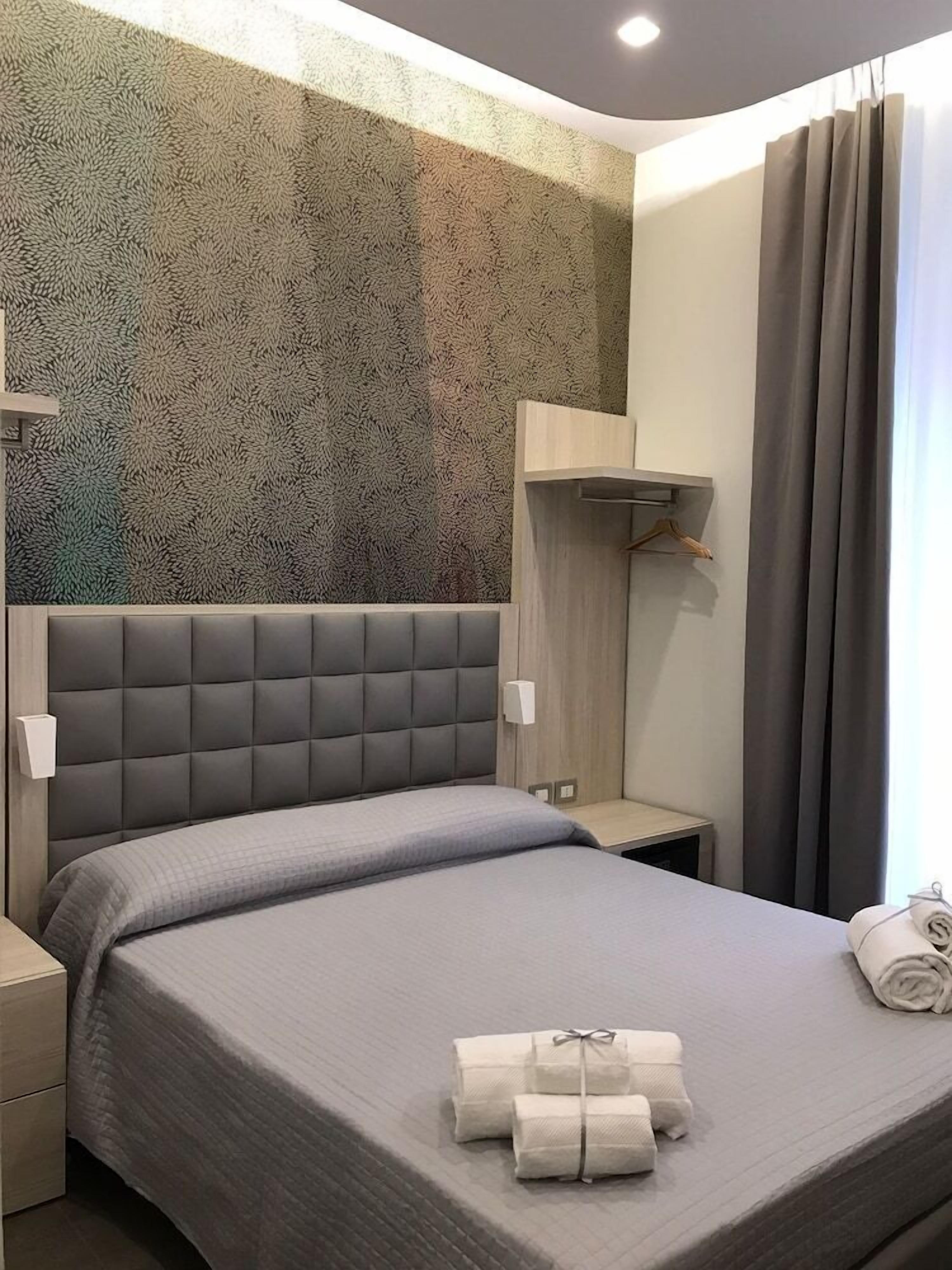 Down duvets, desk, blackout curtains, iron/ironing board