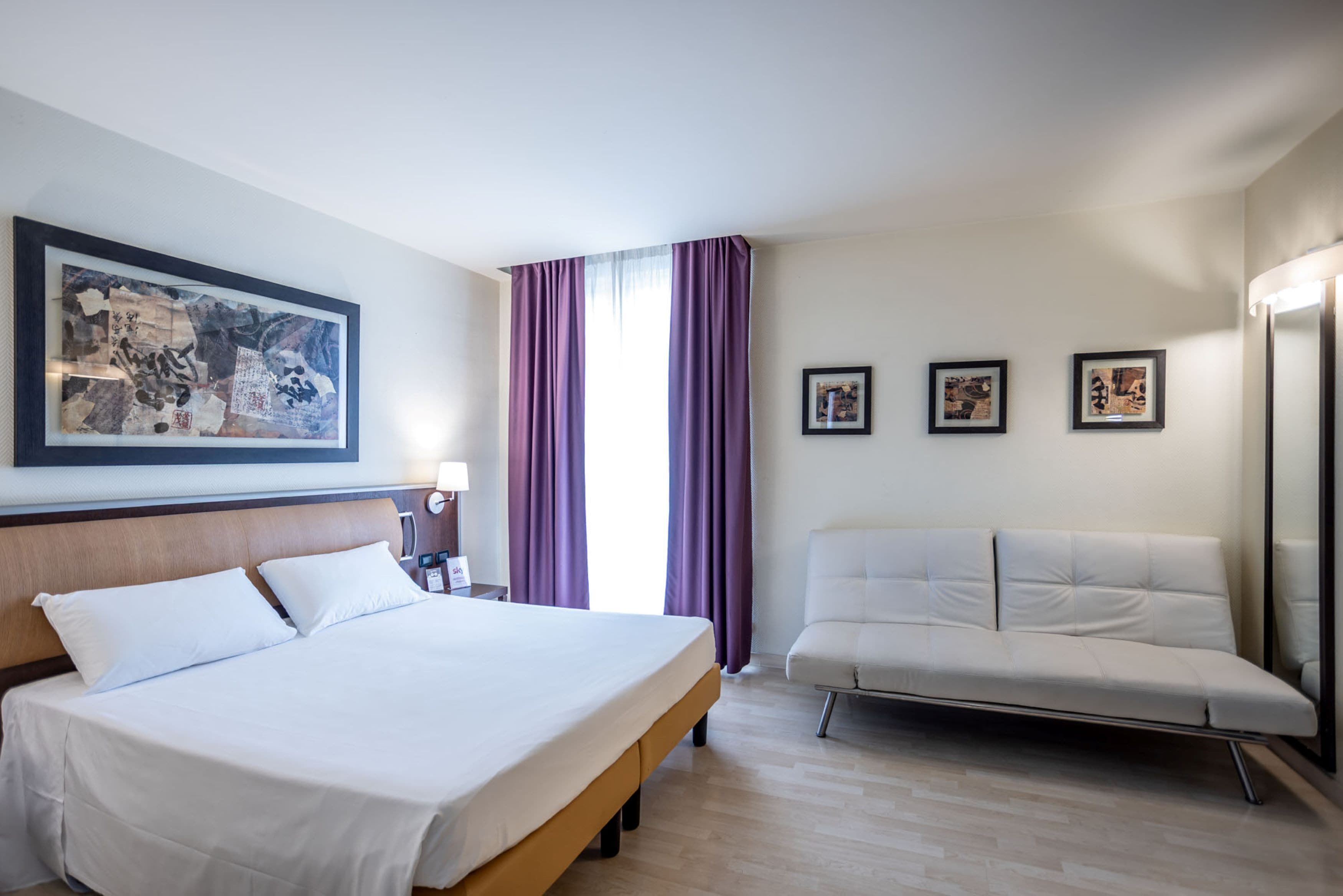 1 Schlafzimmer, hochwertige Bettwaren, Daunenbettdecken, Minibar