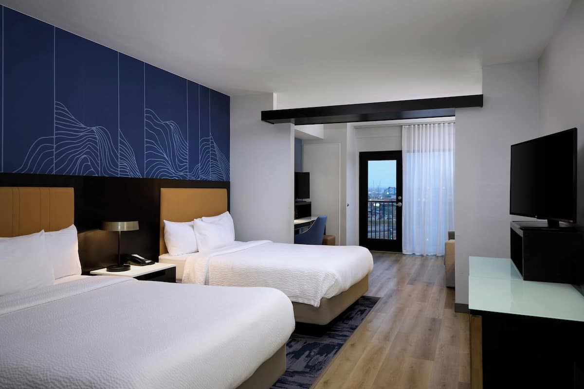 Suite, Multiple Beds, Balcony | 1 bedroom, hypo-allergenic bedding, in-room safe, desk