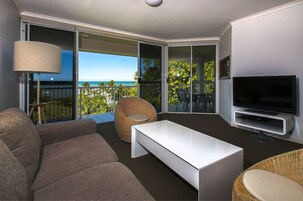 Standard Apartment, 2 Bedrooms, Ocean View (Access between addresses is limited) | Living area | 65-inch TV with digital channels