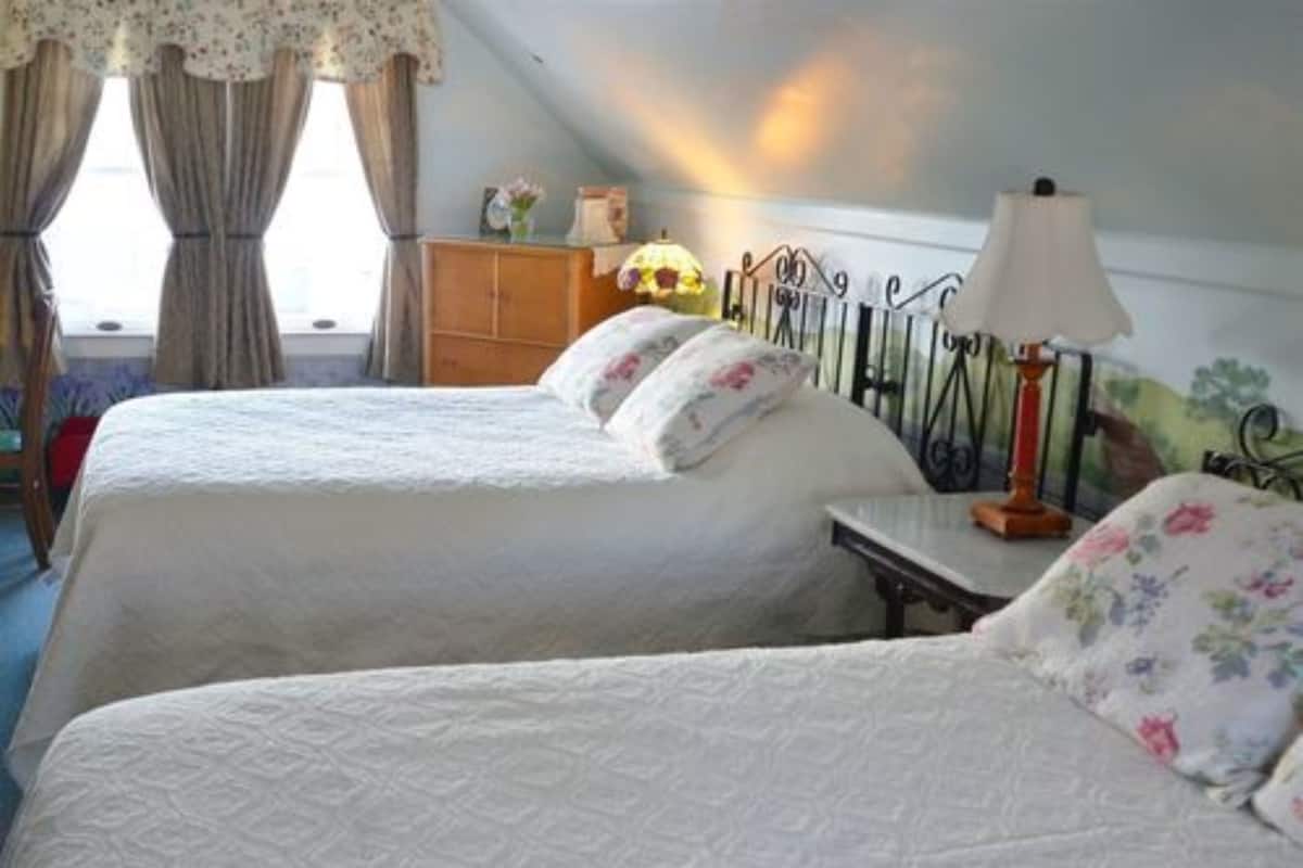 Individually decorated, desk, iron/ironing board, bed sheets