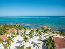 On the beach, sun loungers, beach umbrellas, beach towels