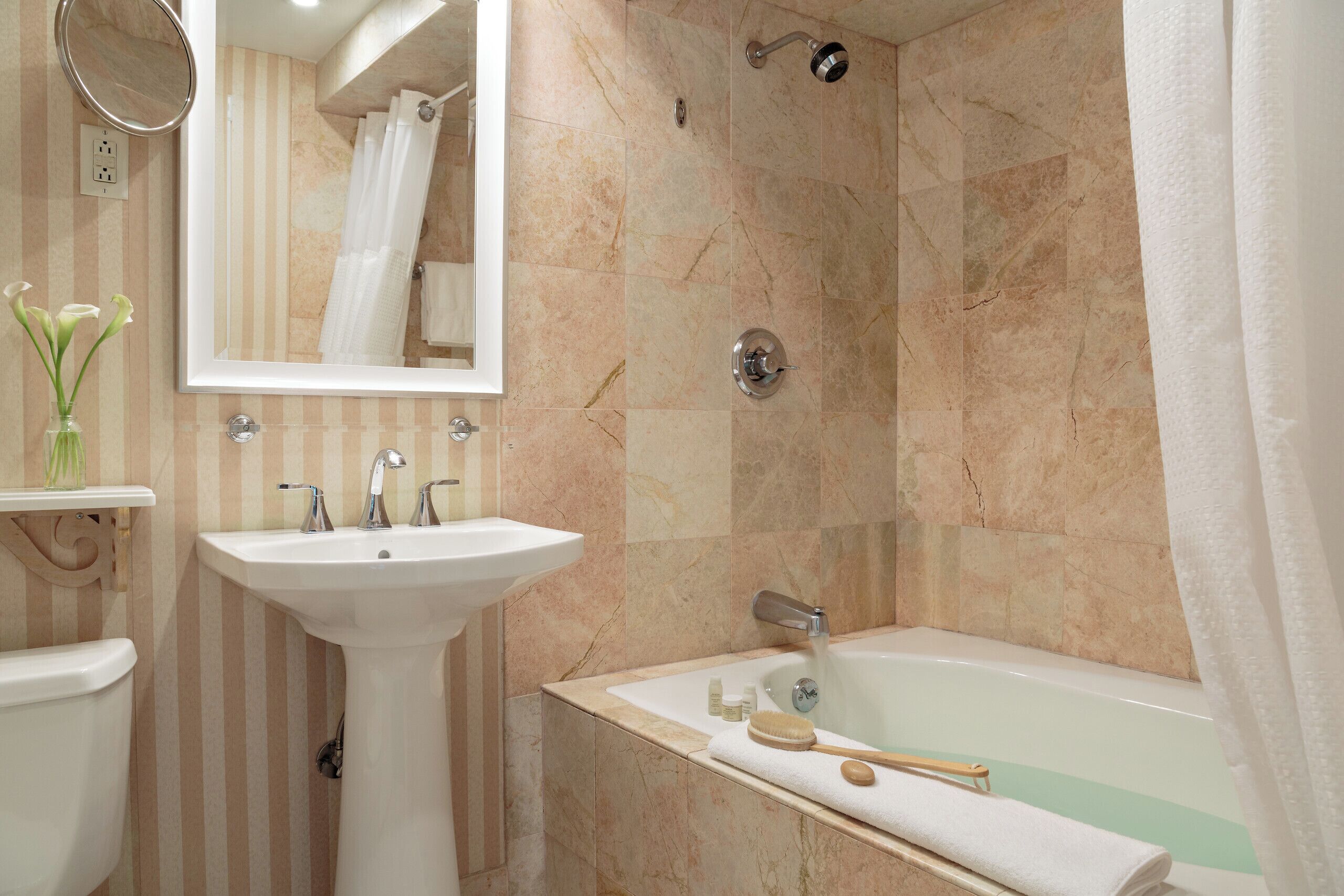 classic suite, 1 king bed with sofa bed | bathroom | combined shower/bathtub, designer toiletries, hair dryer, towels