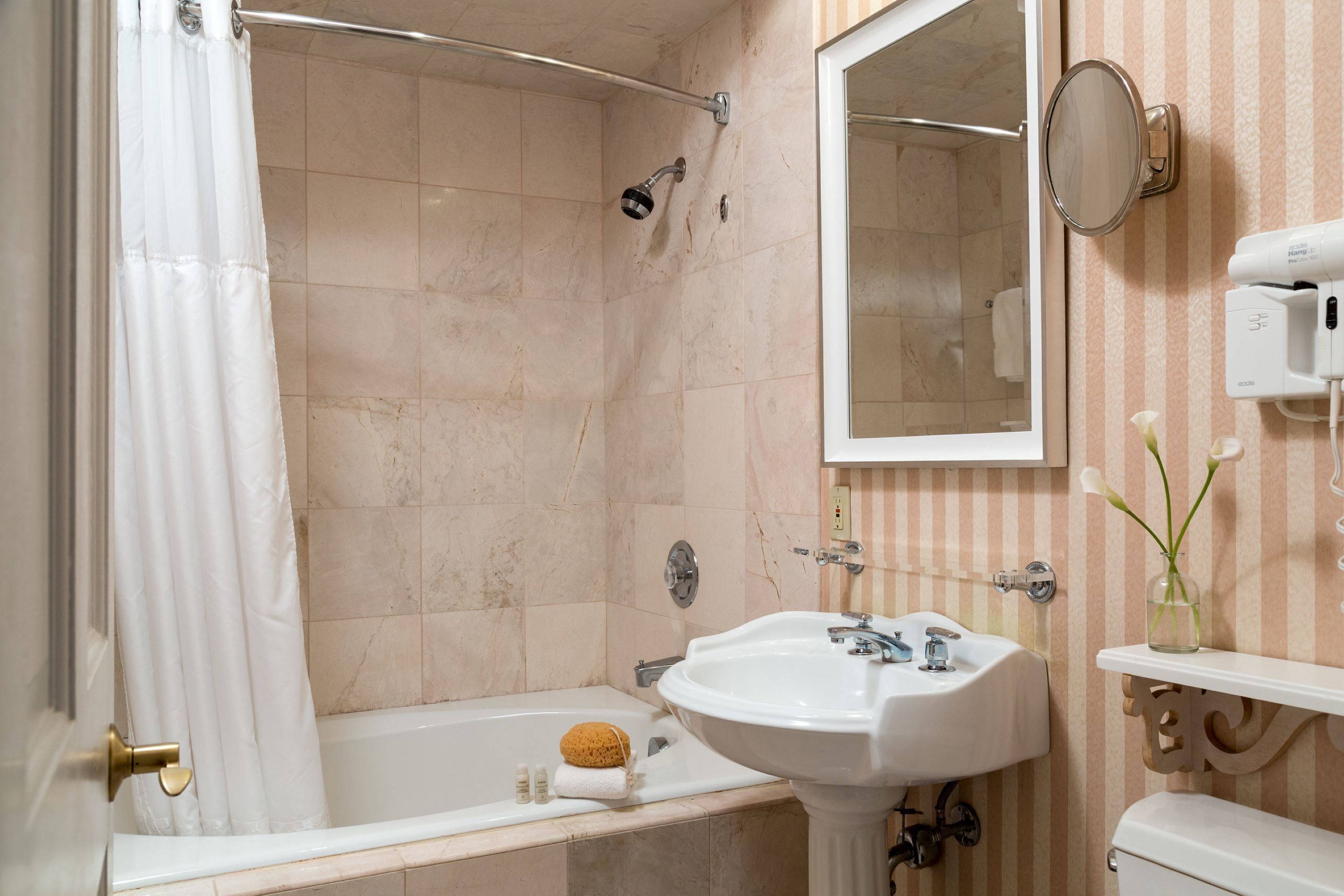 luxury room, 1 king bed | bathroom | combined shower/bathtub, designer toiletries, hair dryer, towels