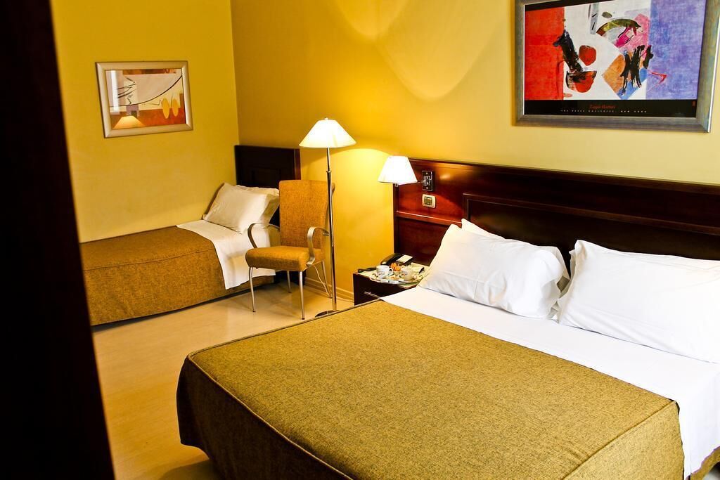 Hypo-allergenic bedding, minibar, in-room safe, desk