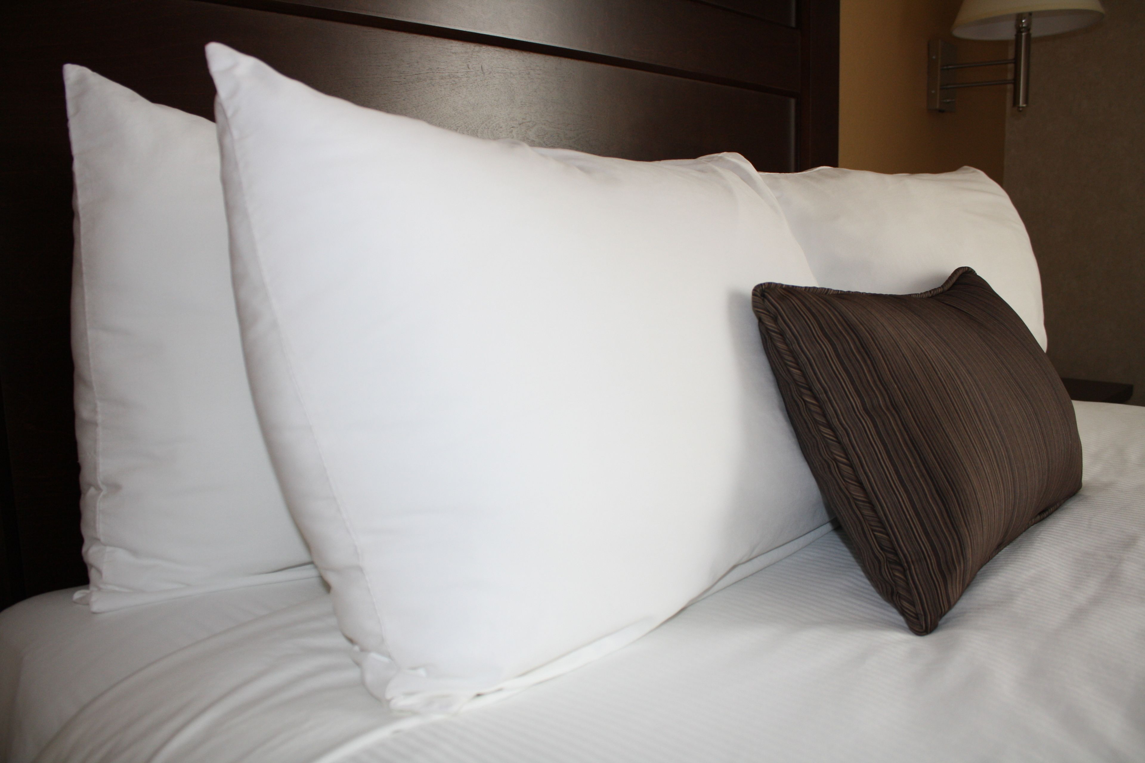 premium bedding, desk, laptop workspace, blackout curtains