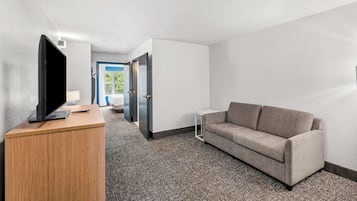 Studio, 1 King Bed | Living area | TV