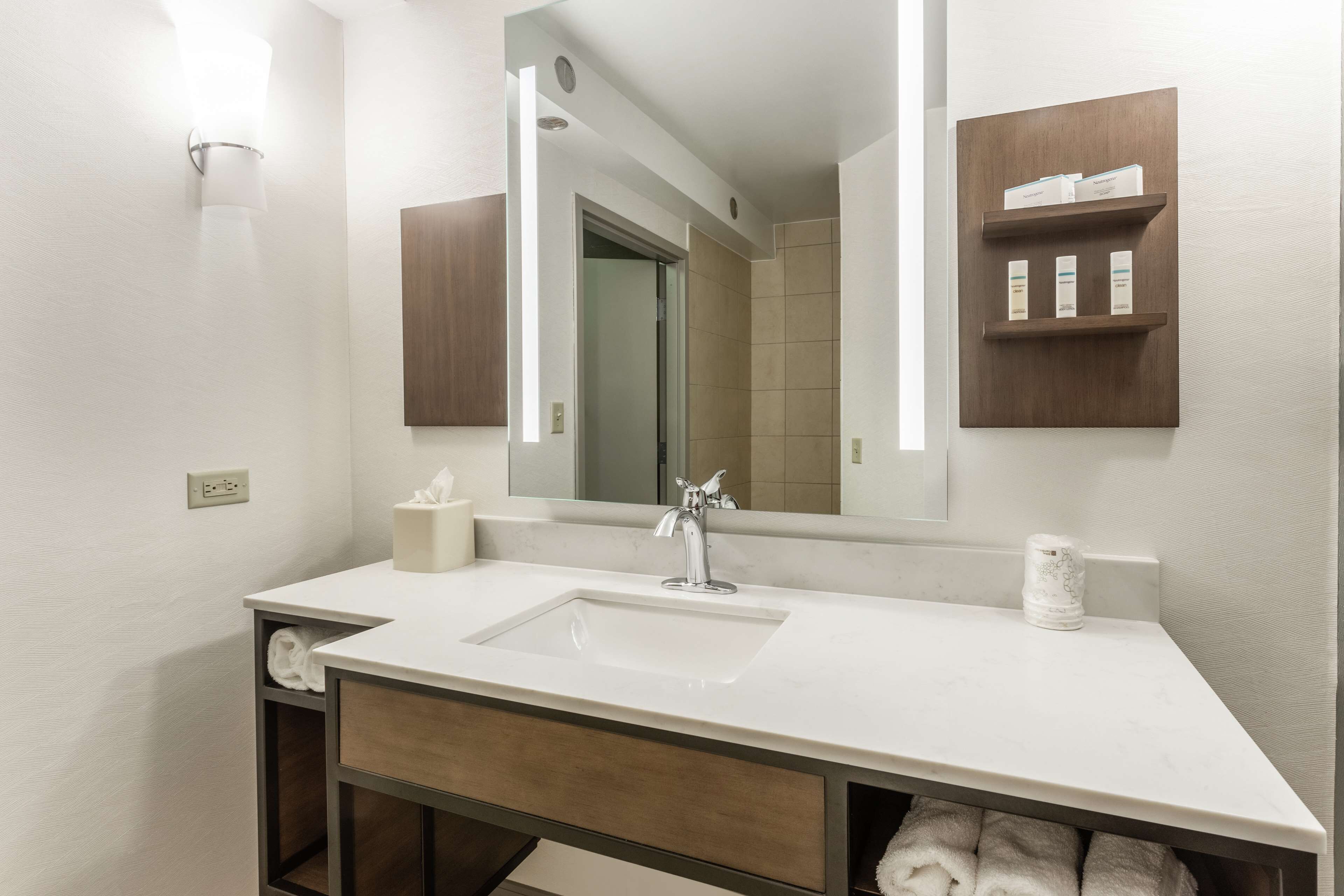 deluxe room, 1 king bed | bathroom | free toiletries, hair dryer, towels