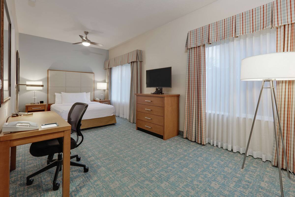 hypo-allergenic bedding, down duvets, desk, blackout curtains