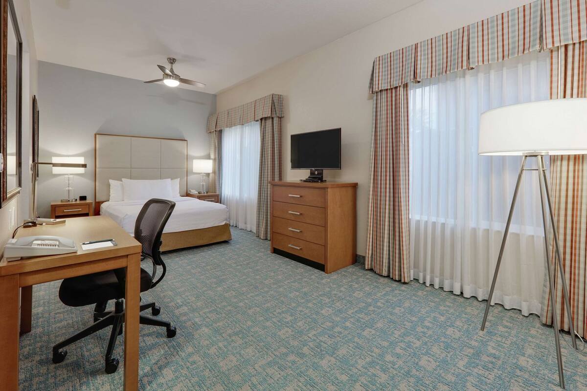 Hypo-allergenic bedding, down duvets, desk, blackout curtains