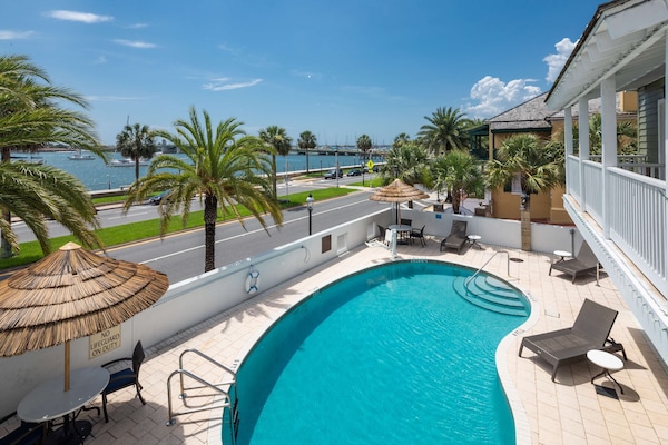 Outdoor pool, open 8 AM to 10 PM, pool umbrellas, sun loungers