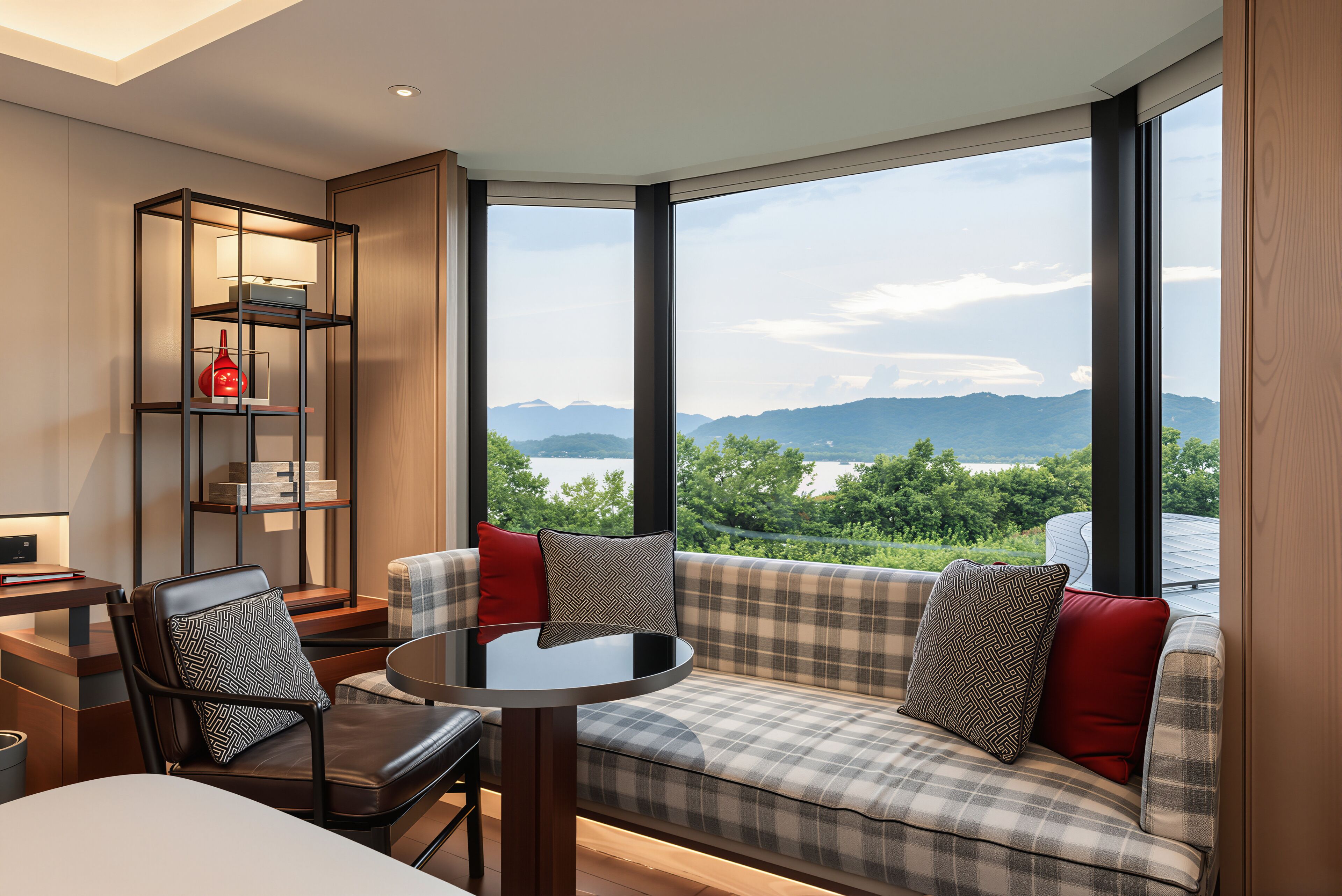 A modern room with a sofa, a table, and a bookshelf.