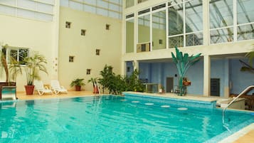 Indoor pool, sun loungers