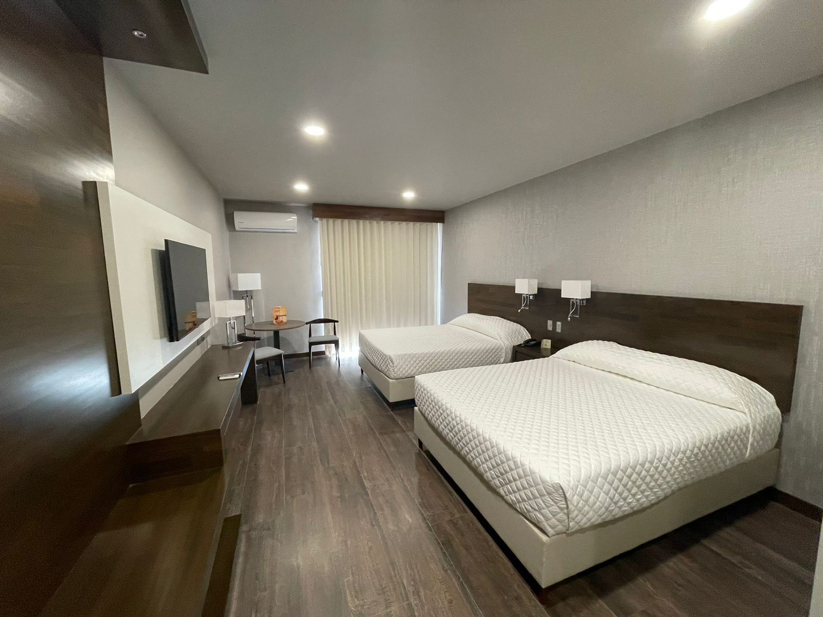 superior double room, 2 queen beds | minibar, in-room safe, individually furnished, desk